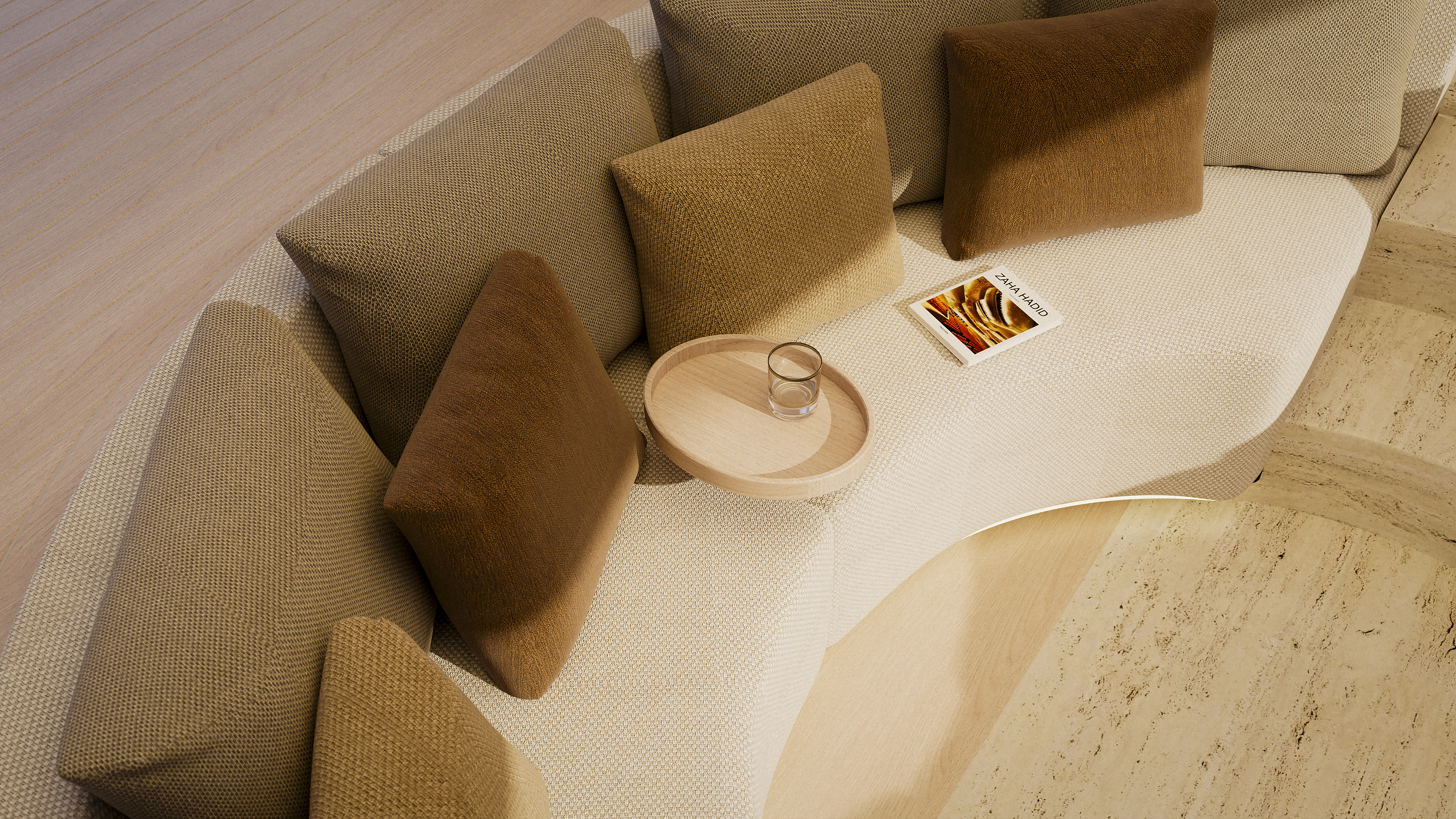 Detail of the circular sofa seating and side tray from Atelier Cala's signature lounge