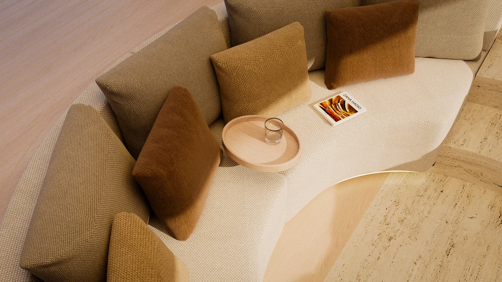 Detail of the circular sofa seating and side tray from Atelier Cala's signature lounge
