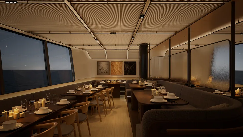 SailXplorer XV53 dining area set for an intimate gala dinner — candlelit tables against the night sea