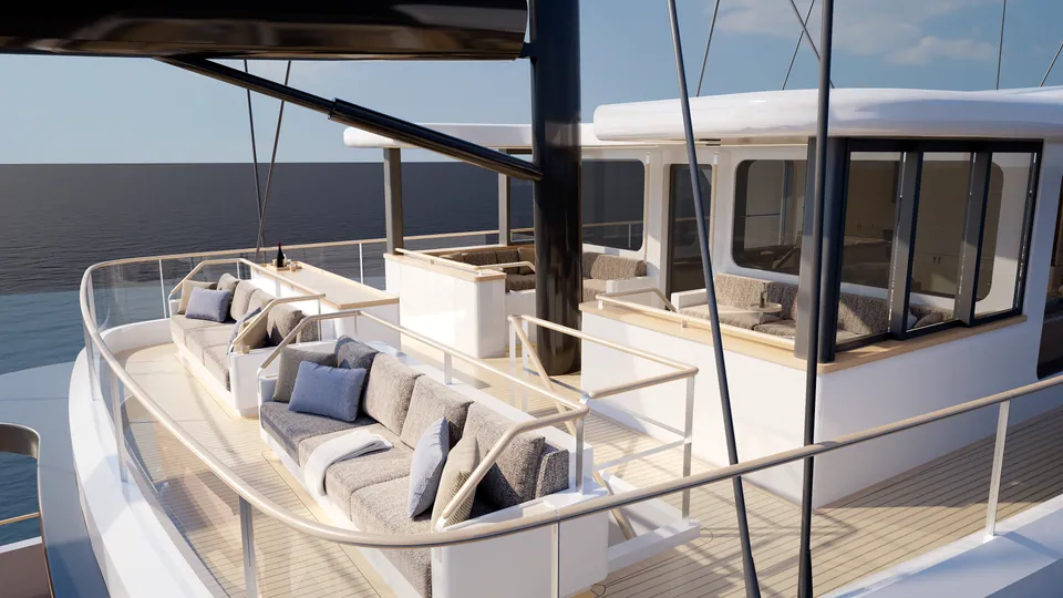 SailXplorer XV53 aft deck — covered lounge seating and bar counter beside the mast, open to the ocean