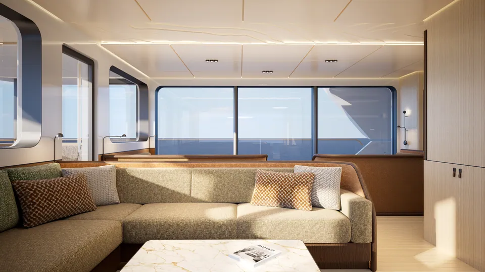 SailXplorer XV53 saloon — L-shaped lounge seating facing the dining nook and ocean view