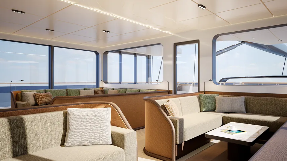 SailXplorer XV53 saloon — corner sofa seating zone beneath the open-air skylight