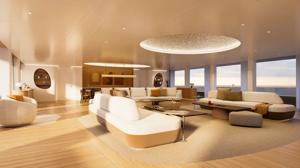 M/Y Waves main saloon — curved sofa seating arranged to face either the horizon or the room