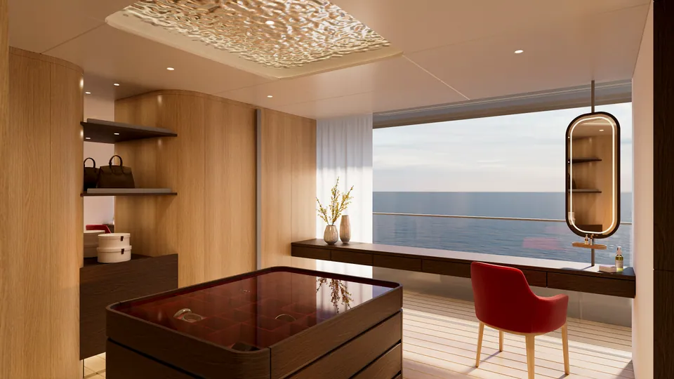 M/Y Waves master cabin dressing area — jewelry cabinet, built-in shelving and private balcony seating